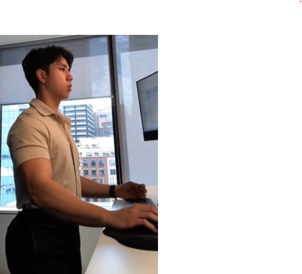 Richard working at a standing desk